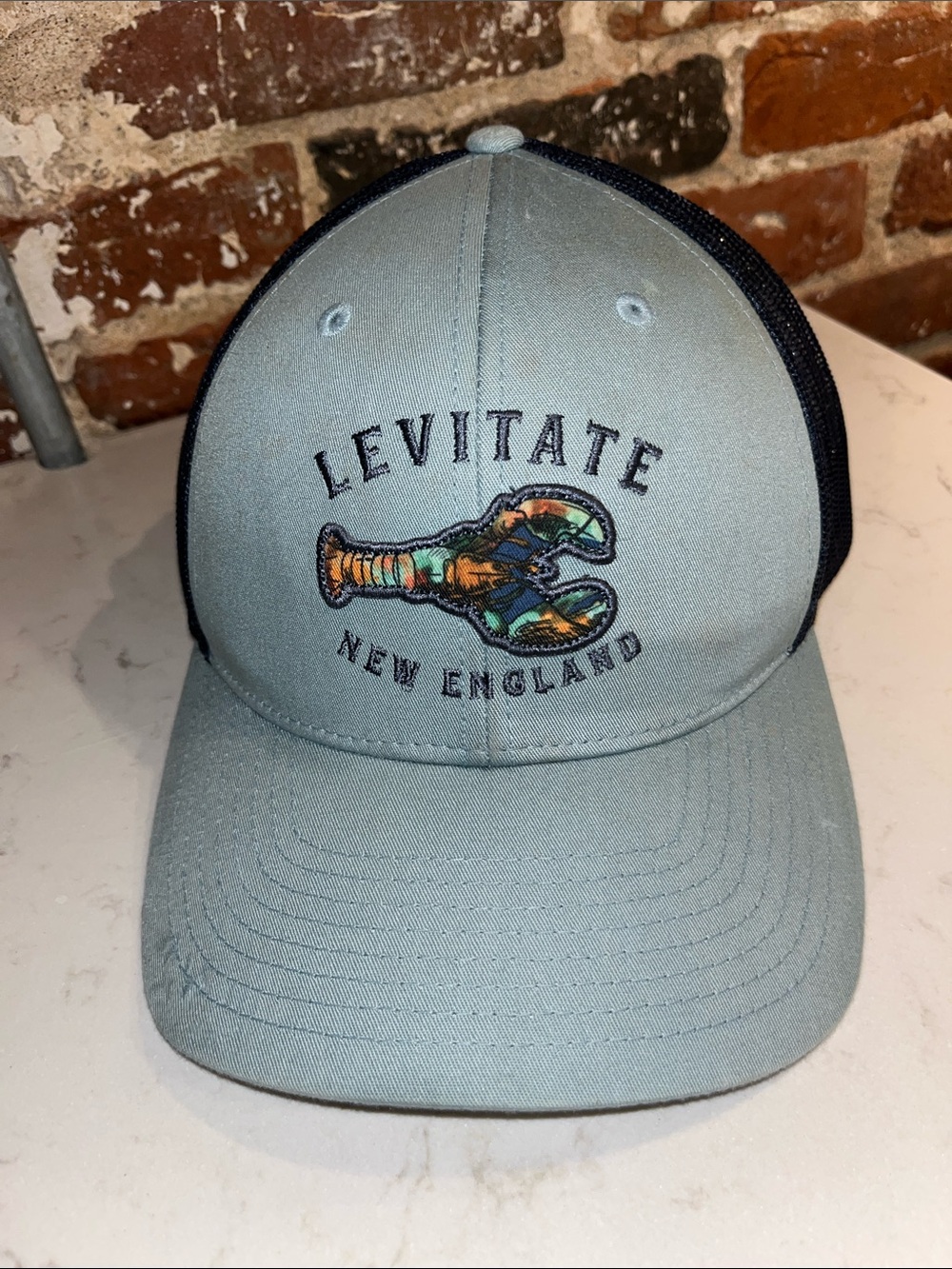 New England Light Blue & Black Trucker Hat